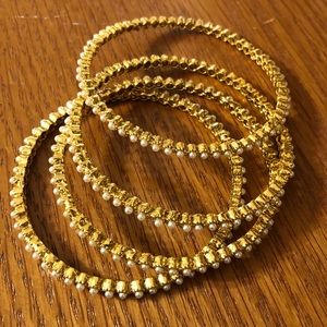 Gold tone and faux pearl bracelets